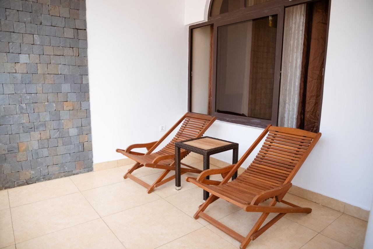 Ndaru Luxury Suites Кигали Экстерьер фото