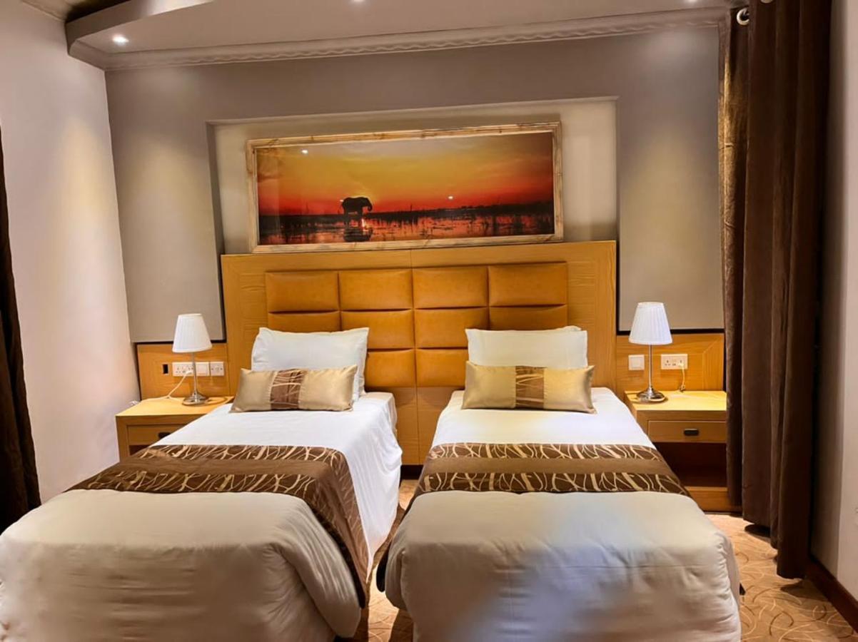 Ndaru Luxury Suites Кигали Экстерьер фото